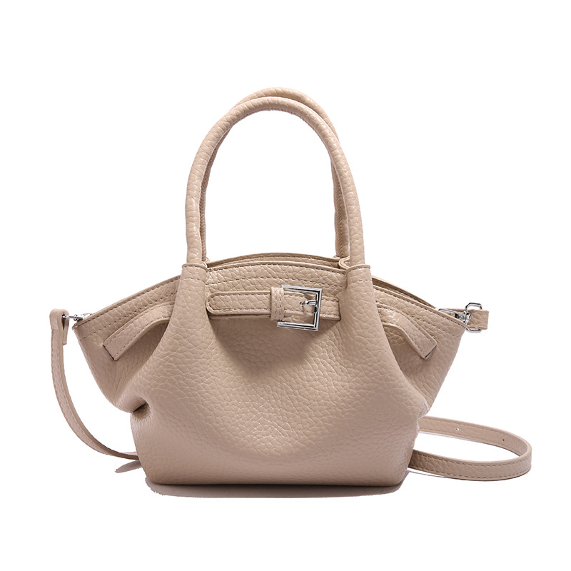 Bolso de textura transfronteriza 2025 verano nuevo estilo bolso de hombro con patrón de lichi bolso de mensajero casual de todo fósforo mujer