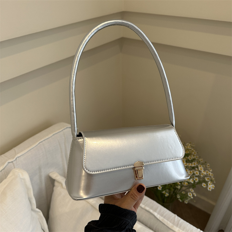 Temperamento simple bolso de hombro de bloqueo de color sólido para mujeres 2024 primavera y verano nuevo nicho de alta calidad bolso de brazo bolso de mujer