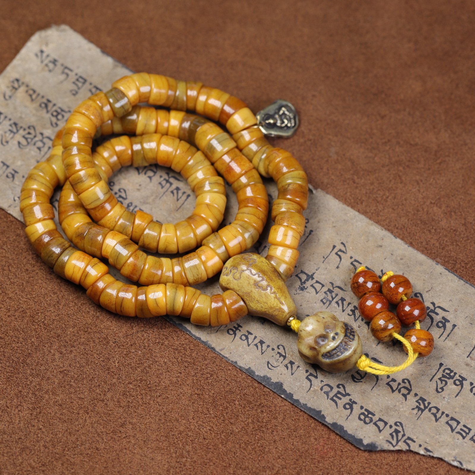 西藏天然牦牛骨猪大肠佛珠手串 做旧藏式猪大肠包浆骨串直播货源