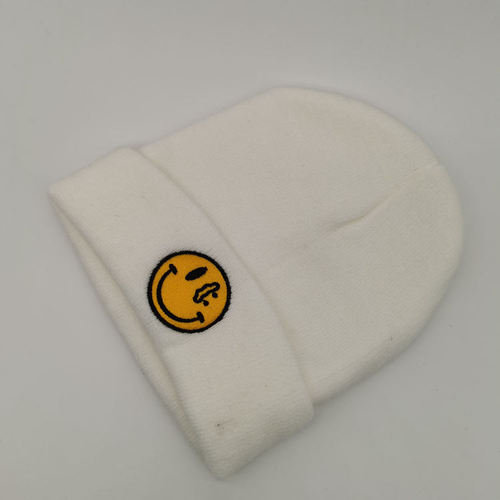 Adult yellow label smiley draw cold hat for men and women knitted hat spring, autumn and winter warm woolen hat couple hat student hat