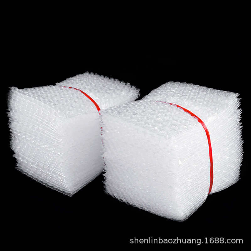Bolsa de burbuja de nuevo material espesado bolsa de burbuja a prueba de choque tamaño de película de burbuja roja fábrica directa para la producción