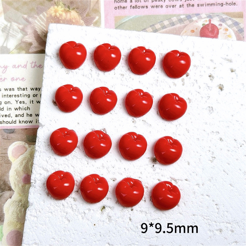 Handmade accessories: simulated half green apple in burgundy color, DIY resin earrings, hair clips, phone cases, nail art, and porcelain accessories