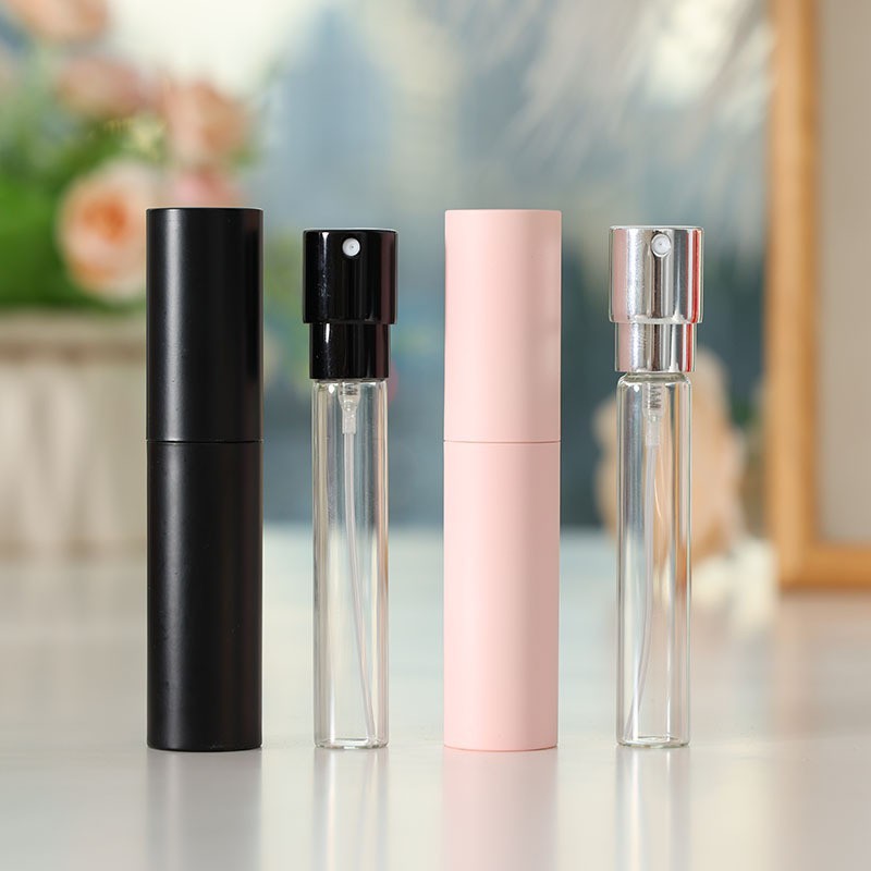 10ml caja de plástico color sólido botella de perfume giratoria tubo de vidrio portátil botella de spray oral maquillaje hidratante presión botella dividida