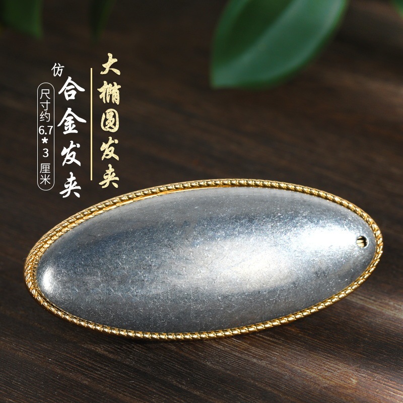 宋錦藍染刺繍部品のネジの下に髪を支えて布を包みます。|undefined
