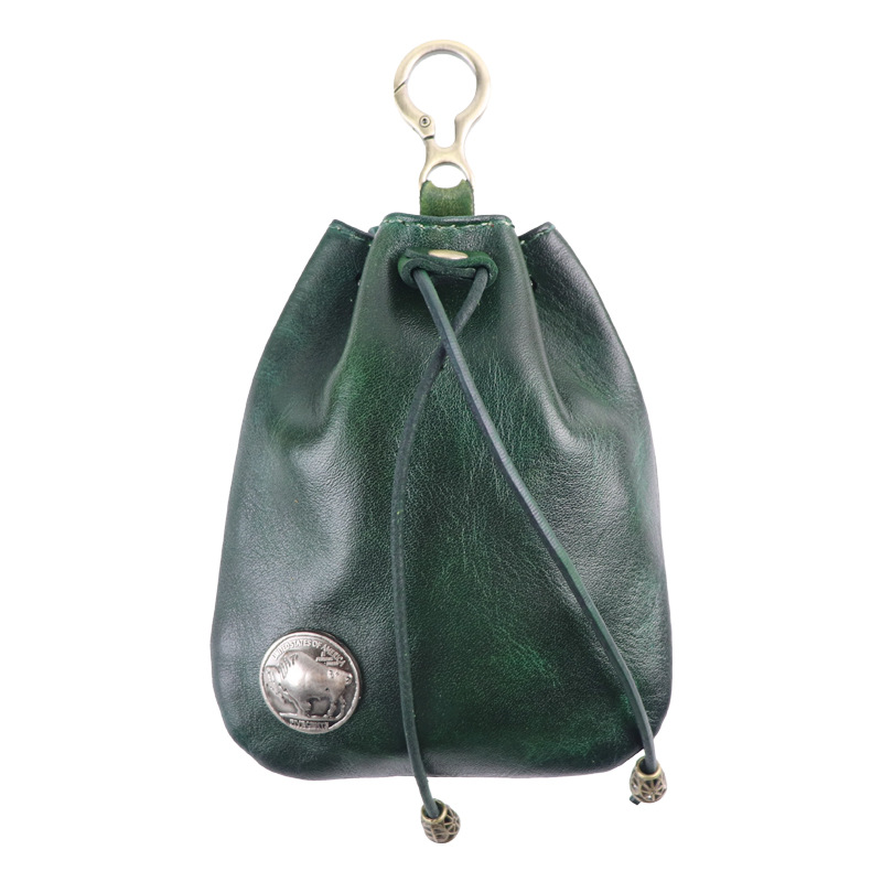 日本のシンプルなトップ層の牛革はなめし革のレトロな女性の香りのカバンのミニのキーホルダーのカードのカバンの小銭入れの収納袋を植えます。