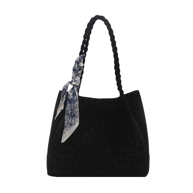 Retro leopardo de gran capacidad bolso tote mujer otoño e invierno 2025 ocio versátil viaje alto sentido de hombro mochila