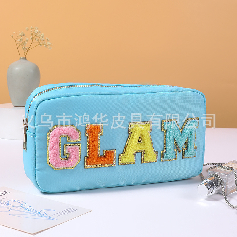 Transfronterizo amazon popular toalla bordada carta de nylon bolsa de cosméticos bolsa de almacenamiento de gran capacidad informal de las mujeres a prueba de agua