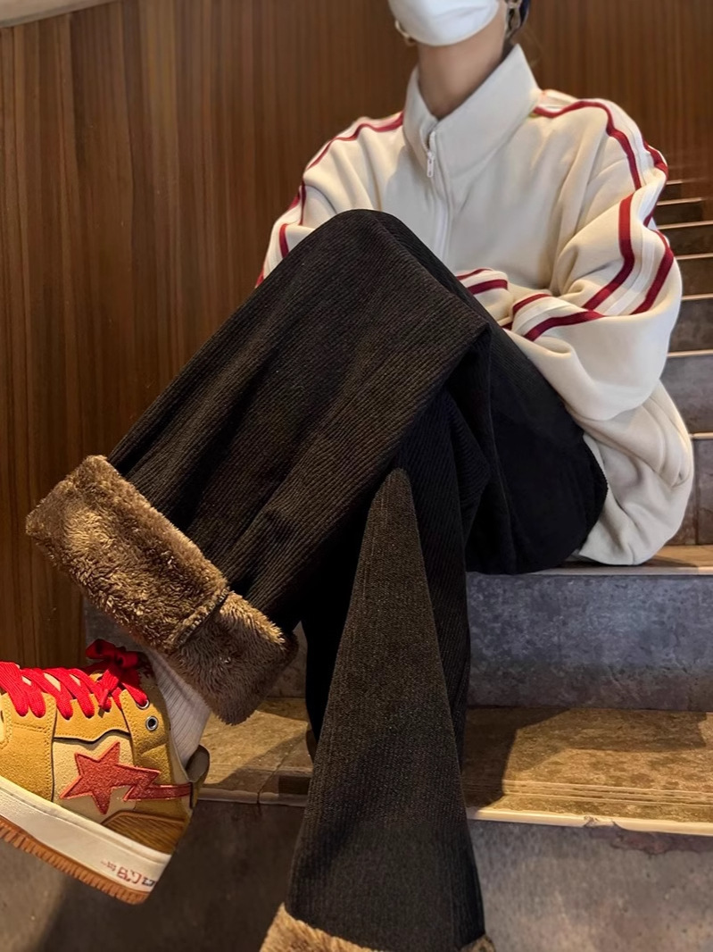 耐寒性零下40度のズボンの男性は冬に羊の小毛をつけます。