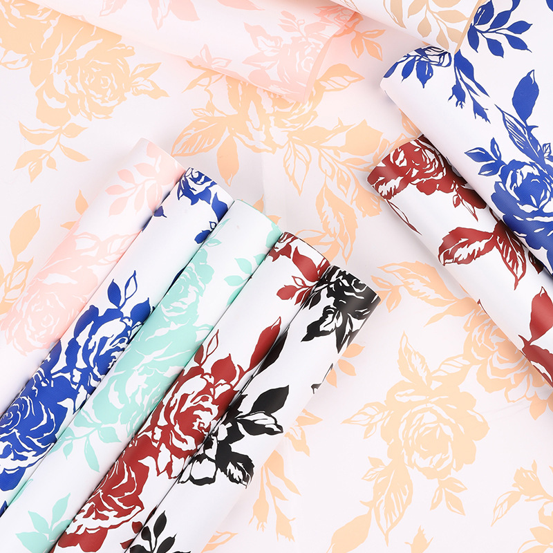 Huaxi Qixi historia del día de San Valentín rosa impresa película impermeable red papel de embalaje de flores ramo de flores papel de embalaje floral