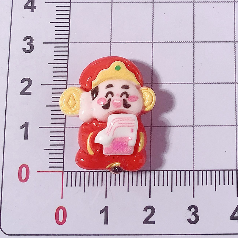 Año Nuevo dibujos animados dios de la fortuna Yuanbao accesorios de resina agujero zapatos caja de teléfono celular crema pegamento DIY automóvil control central dios de la fortuna