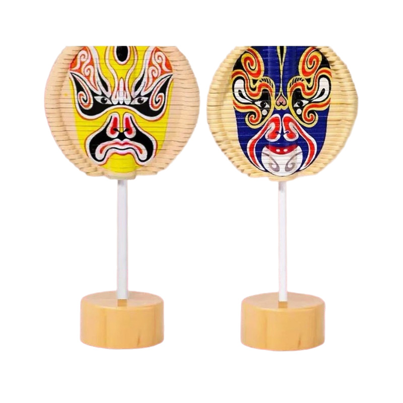回転京劇の顔の譜の震える音の同じタイプの手はスパイラルの木のロリポップのABSの材質を揺らします。