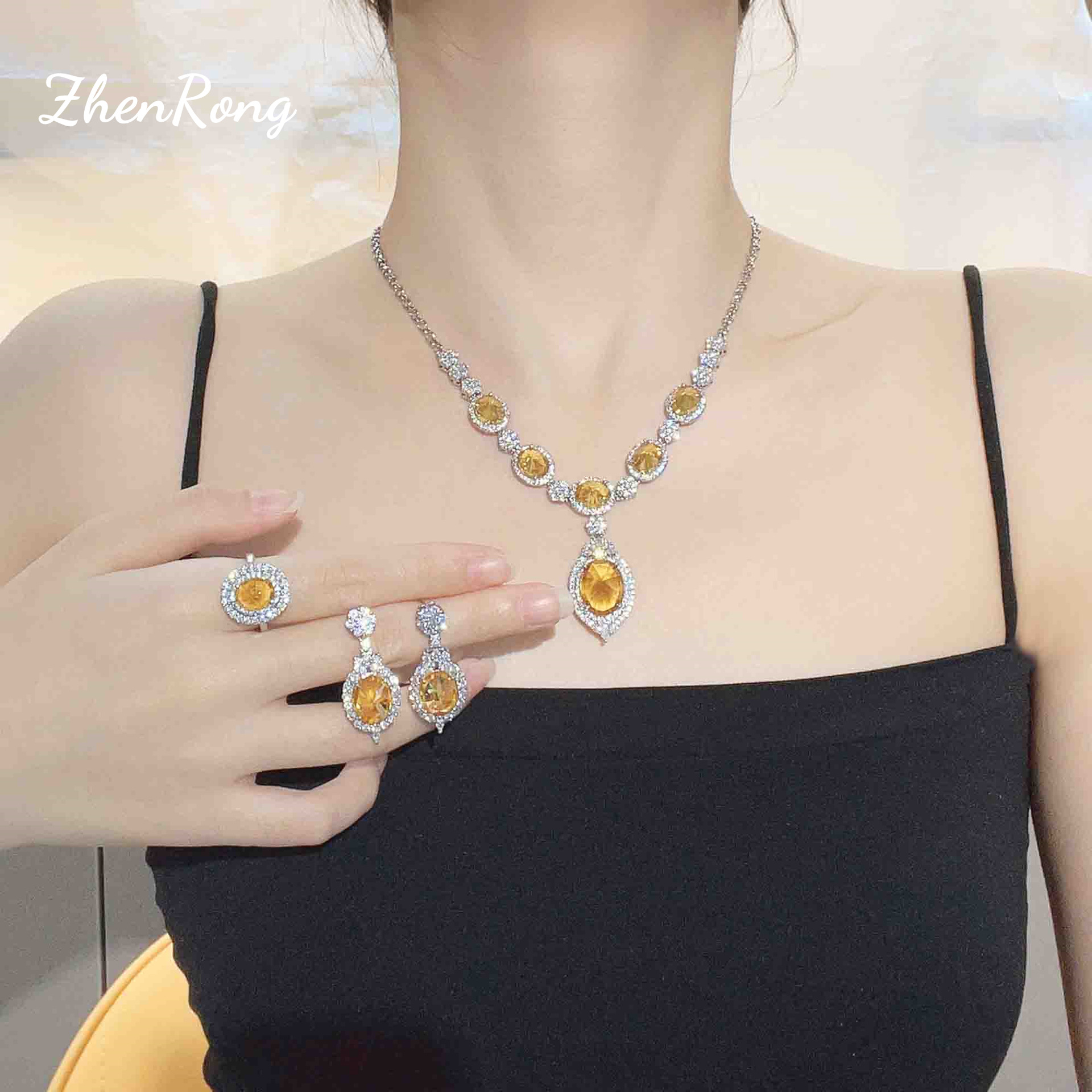 Súper Hada temperamento creativo collar anti-incrustaciones hembra brillante amarillo diamante aretes anillo abierto pull pulsera colorido tesoro conjunto de cuatro piezas