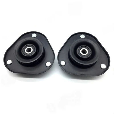 Front shock absorber top damping system