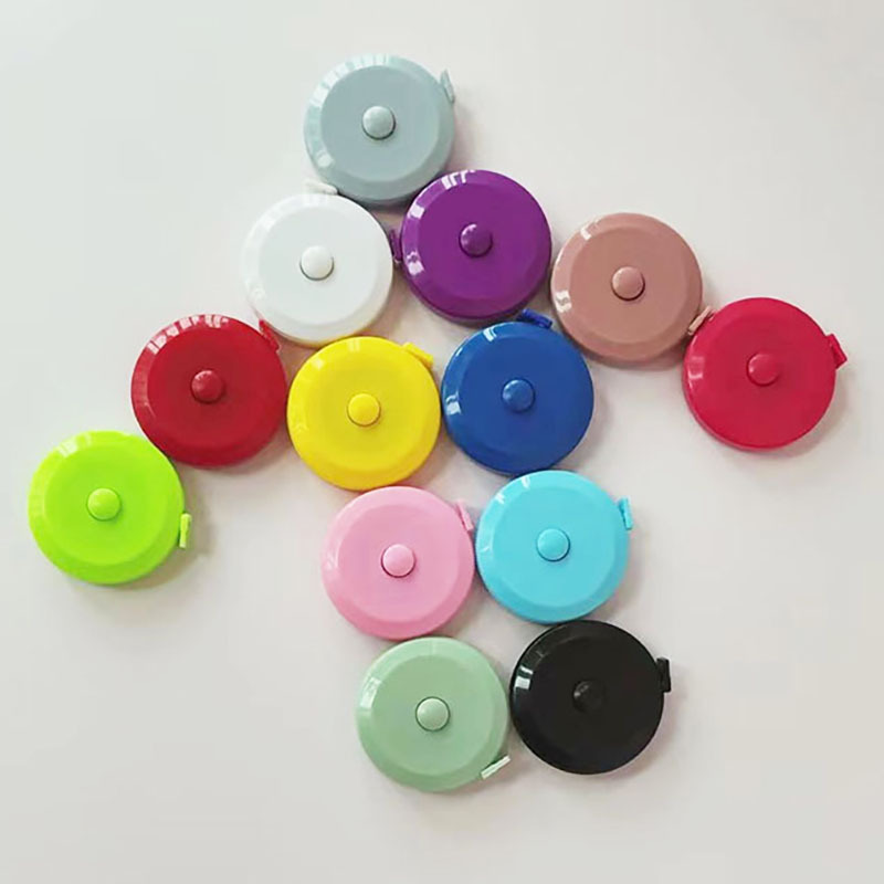 Cinta métrica de Color 1,5 m Mini cinta métrica retráctil redonda en stock publicidad LOGO regla de regalo regla de tres circunferencia Regla suave