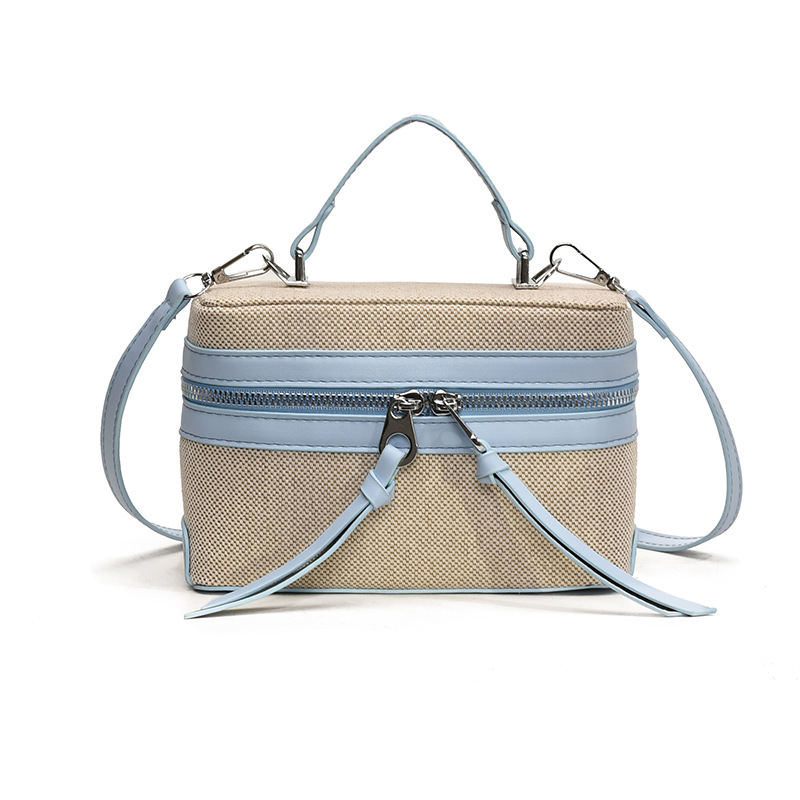 2025 nuevo nicho de diseño retro color contrastante empalme bolso de mano personalidad viaje elegante mochila de hombro