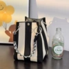 Ring buckle bag vertical pattern black rice
