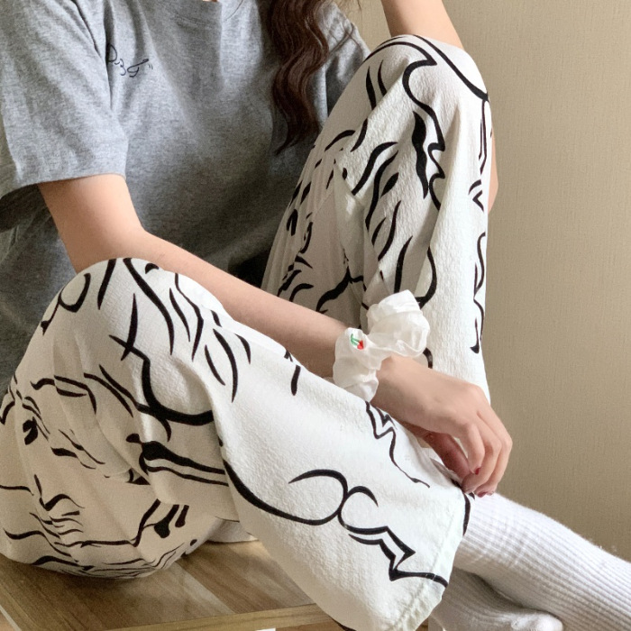 2024 pijamas de verano nuevos hilos de espuma de espuma delgados pantalones anti-mosquitos pantalones de dibujos animados dulces pantalones caseros al por mayor