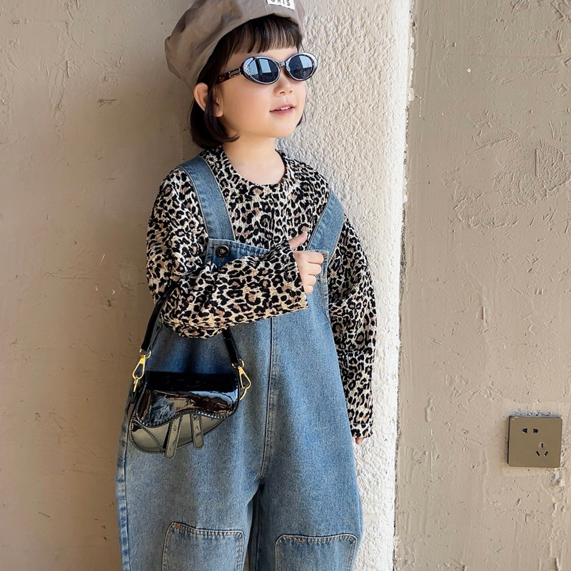 Nuevo bolso de hombro para niñas estilo coreano con acabado brillante, bolso de sillín infantil de color sólido a la moda, bolso moderno para niños para comercio transfronterizo.