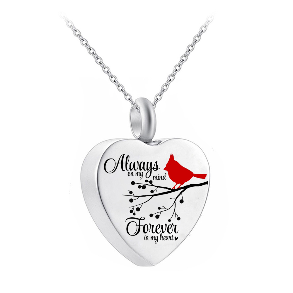 AliExpress de acero inoxidable torcido melocotón en forma de corazón collar de hombres y mujeres de estilo europeo y americano ataúd cinerario letras conmemorativas colgante de amante de mascotas
