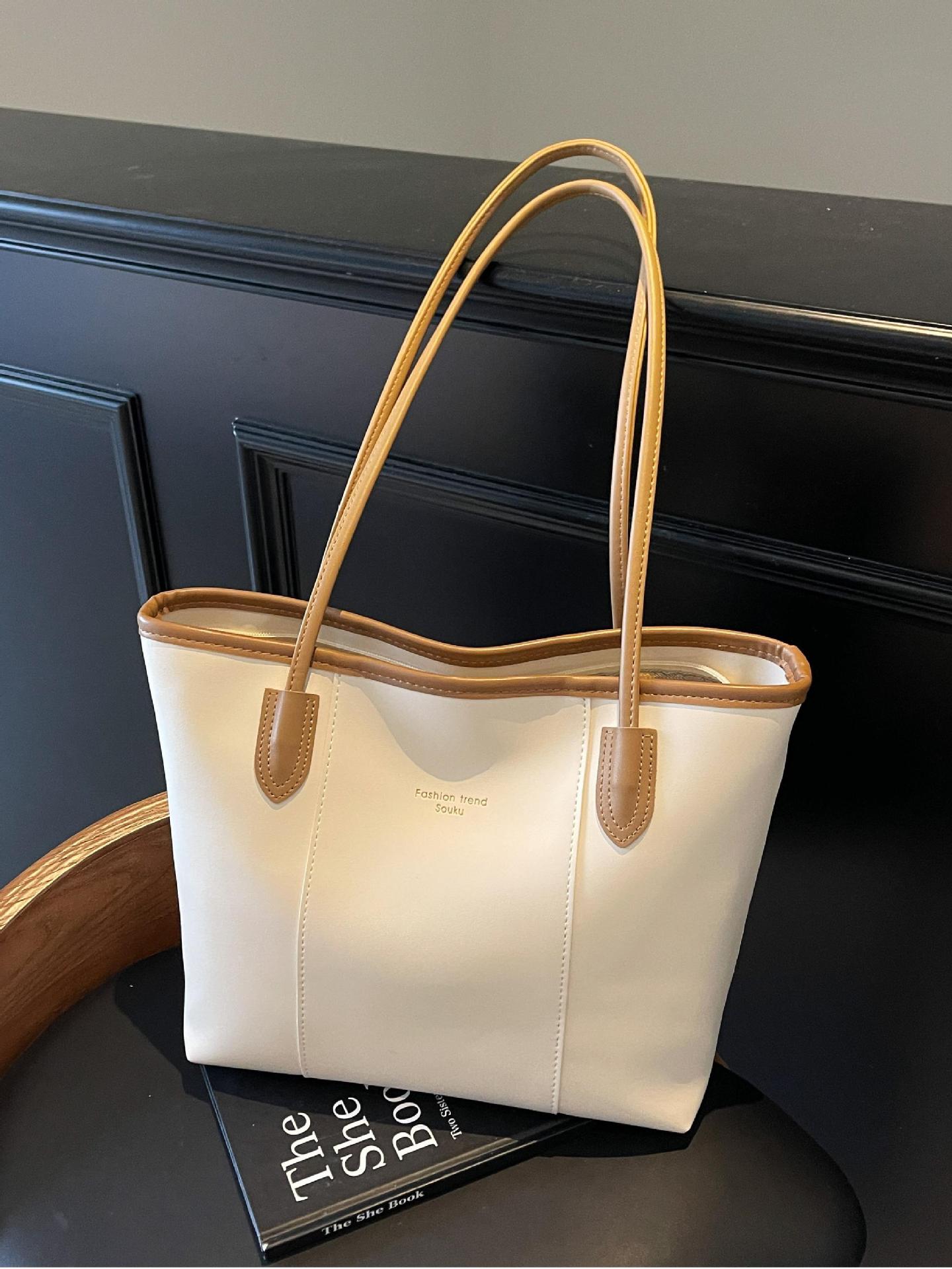 Bolso Tote nuevo producto más vendido transfronterizo para mujer de gran capacidad 2025 todo-fósforo casual simple de alta calidad bolsa de axila de un solo hombro