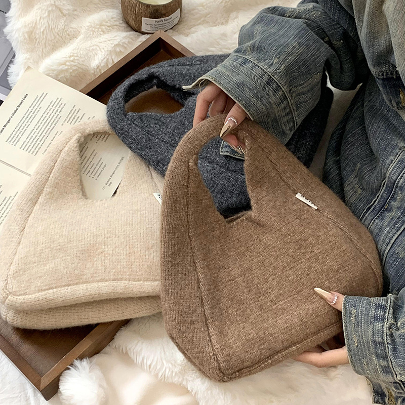 Bolso de hombro 2025 nuevo otoño e invierno nuevo estilo coreano simple y versátil bolso de muñeca de punto de gran capacidad bolso