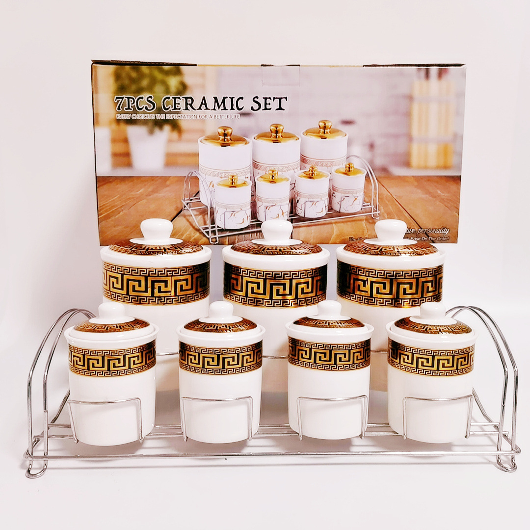 Exportar a Oriente Medio Arabia Saudita cerámica galvanoplastia cilíndrica condimento tarro almacenamiento café tarro con marco de hierro de doble capa