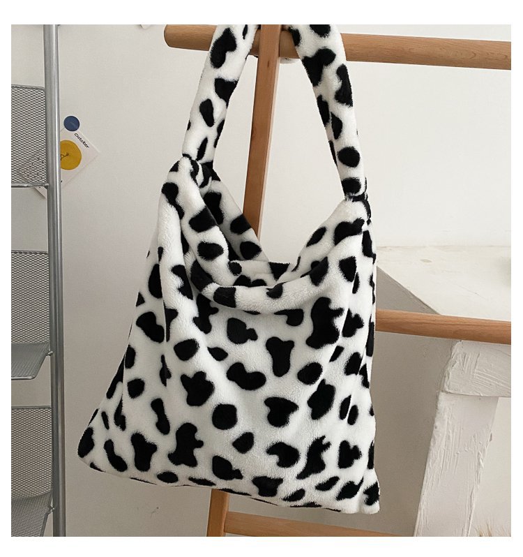 Bolsa de felpa para mujer Otoño e Invierno nueva moda 2023 hombro mensajero bolsa vaca estilo occidental gran capacidad estudiante bolsa