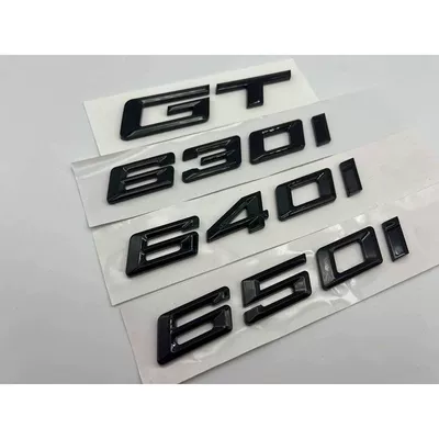 black emblems, lettering, and rear — Car logo