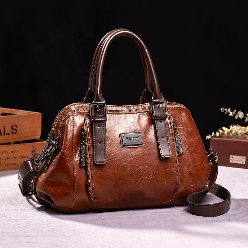 2026 New Retro Fashion European and American Style Single-Shoulder Handbag Crossbody Large Capacity Soft Leather Pillow Boston Women's Bag 2026 New Retro Fashion European and American Style Single-Shoulder Handbag Crossbody Large Capacity Soft Leather Pillow Boston Women's Bag