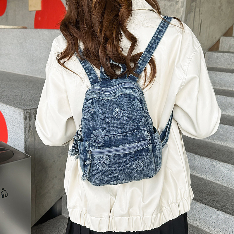 Mochila de denim japonesa retro 2026 nueva moda de mochila de viaje universal diaria