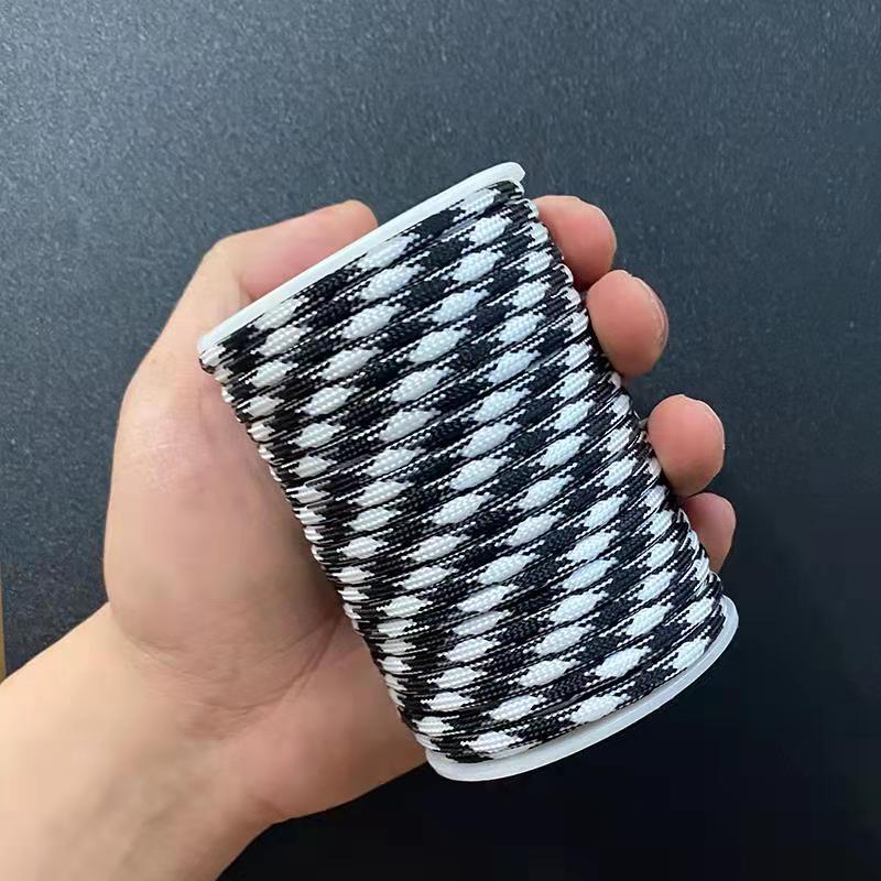 Paracaidistas de polipropileno para acampar al aire libre remolque rescate tienda atada cuerda de montañismo a prueba de viento 31 metros 9 núcleos 7 núcleo cuerda de paraguas en rollo