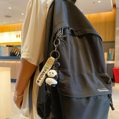 Baimao original wood carving style panda series keychain creative and exquisite hand-raising panda couple key chain bag pendant