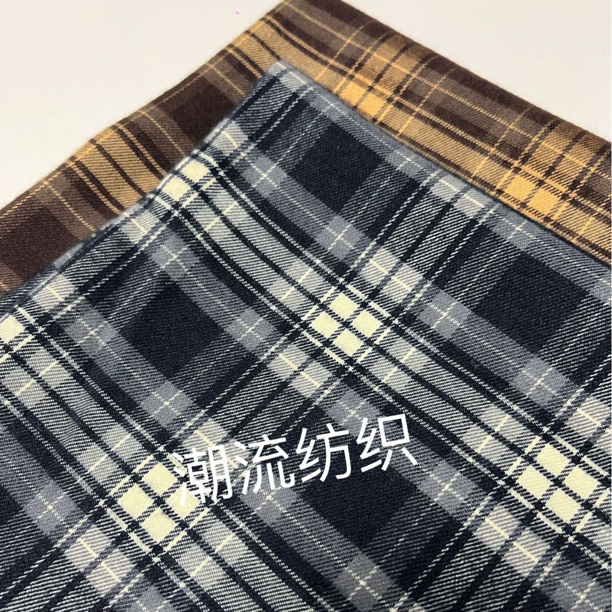 新款色织TR磨毛法兰绒格子面料 欧美男女装彩格西服西装布料现货