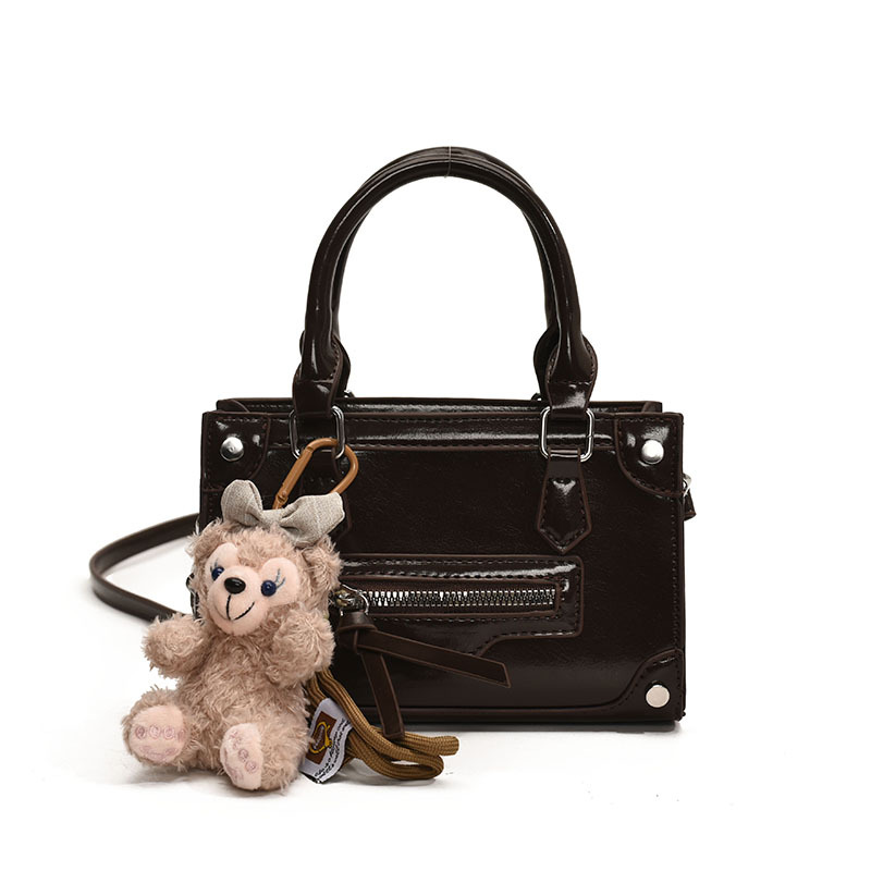 Inglés estilo retro bolsa de motocicleta mujer 2025 nueva moda bolsos de mano de moda bolsos personales de hombro