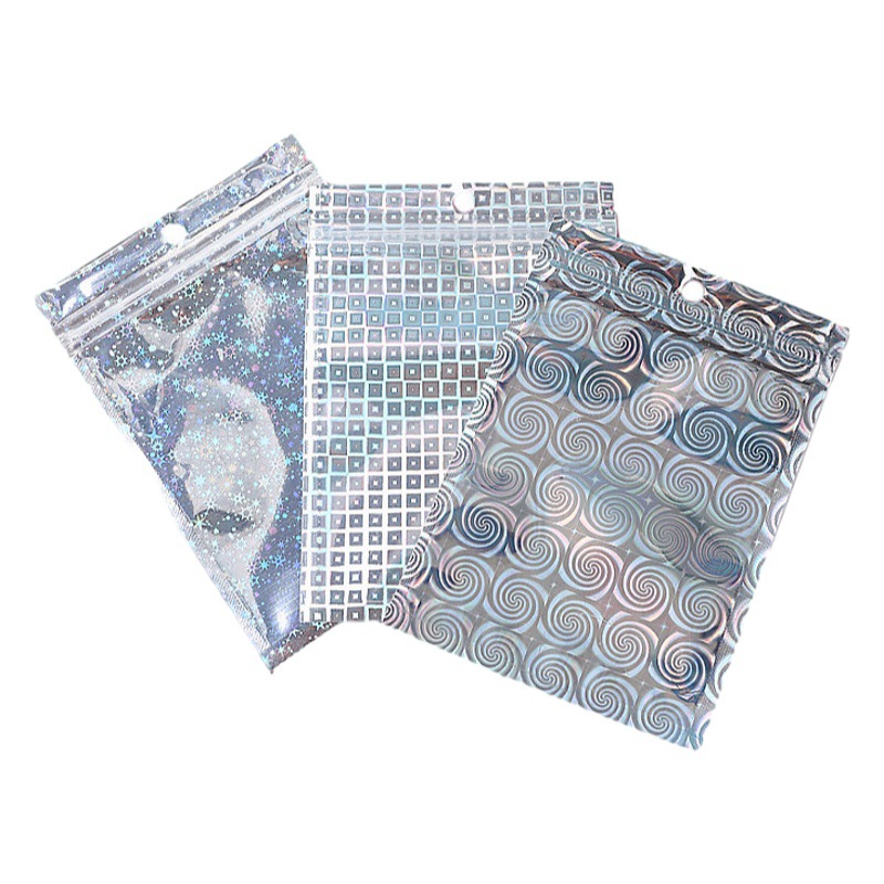 Bolsa de embalaje láser joyería teléfono móvil Shell Yin y Yang hueso bolsa ziplock bolsa arco iris magia color plástico aluminio láser bolsa