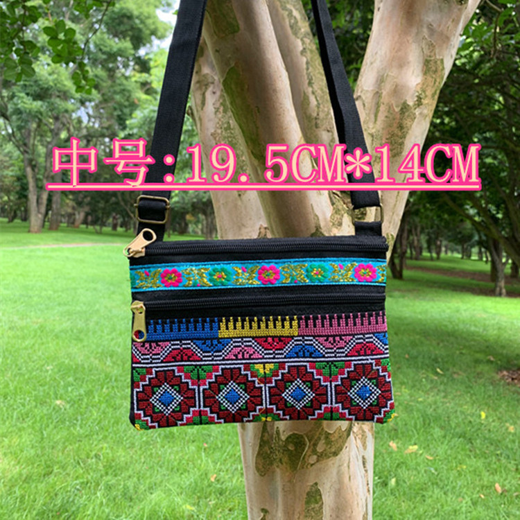 Riñonera bordada étnica de Yunnan con tres cremalleras, diseño artesanal tradicional