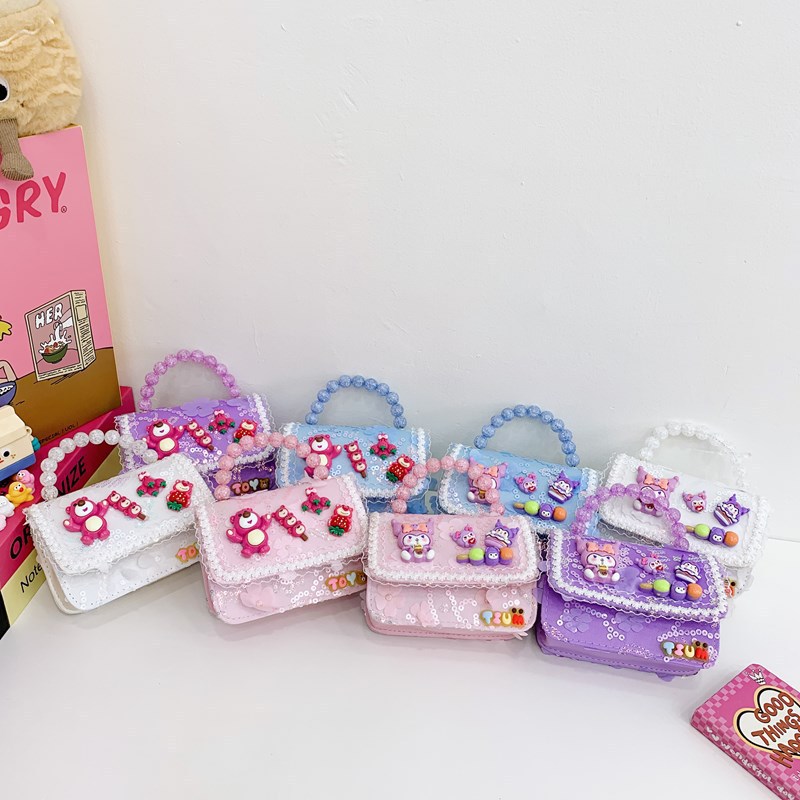 Accesorios para bebés bolsos de cambio, bolsos de hombro de moda, dibujos animados, nuevo estilo coreano, bolsos de mano para niños.