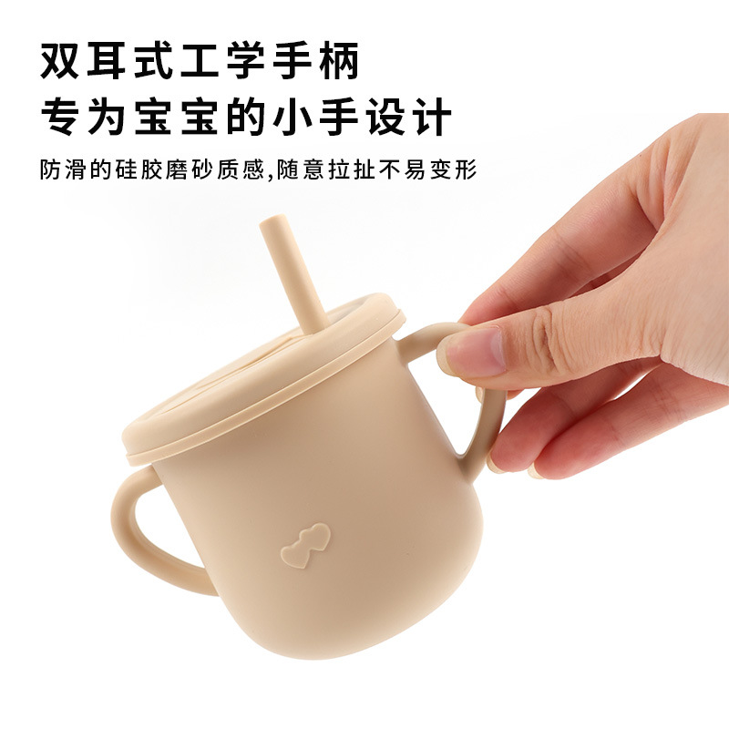 Taza de agua de paja de silicona para niños de grado alimenticio Taza de agua a prueba de caídas Taza de agua de silicona binaural para bebés Taza de silicona para aprender a beber