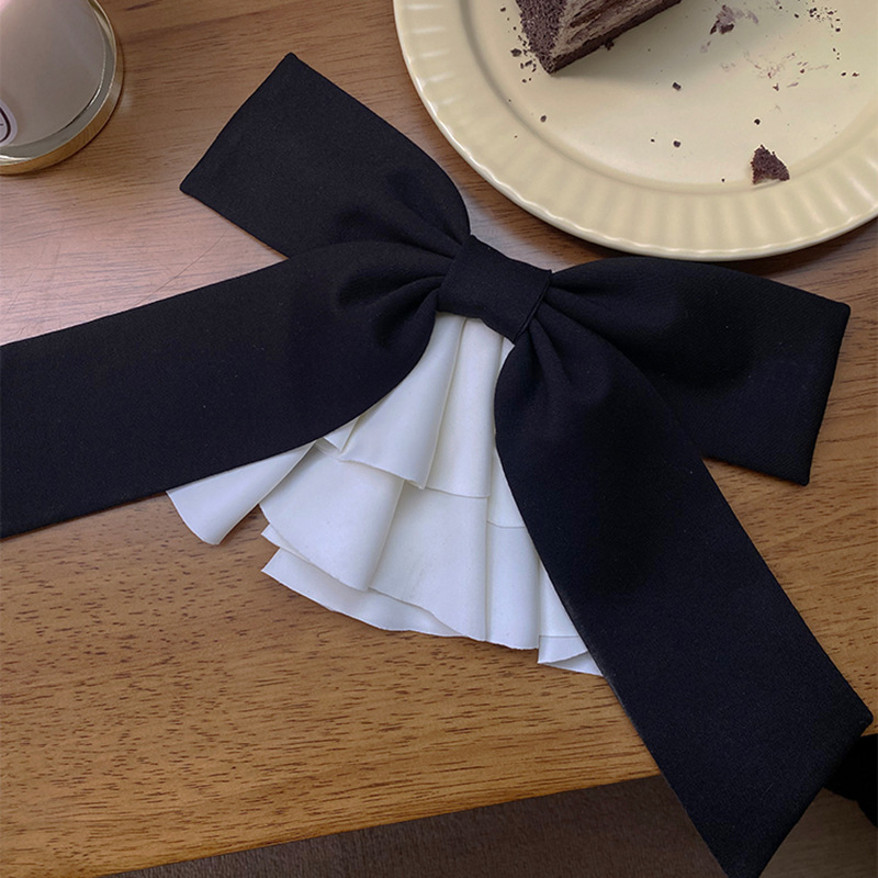 Fermaglio per capelli con fiocco in raso accessorio elegante_voghion.com