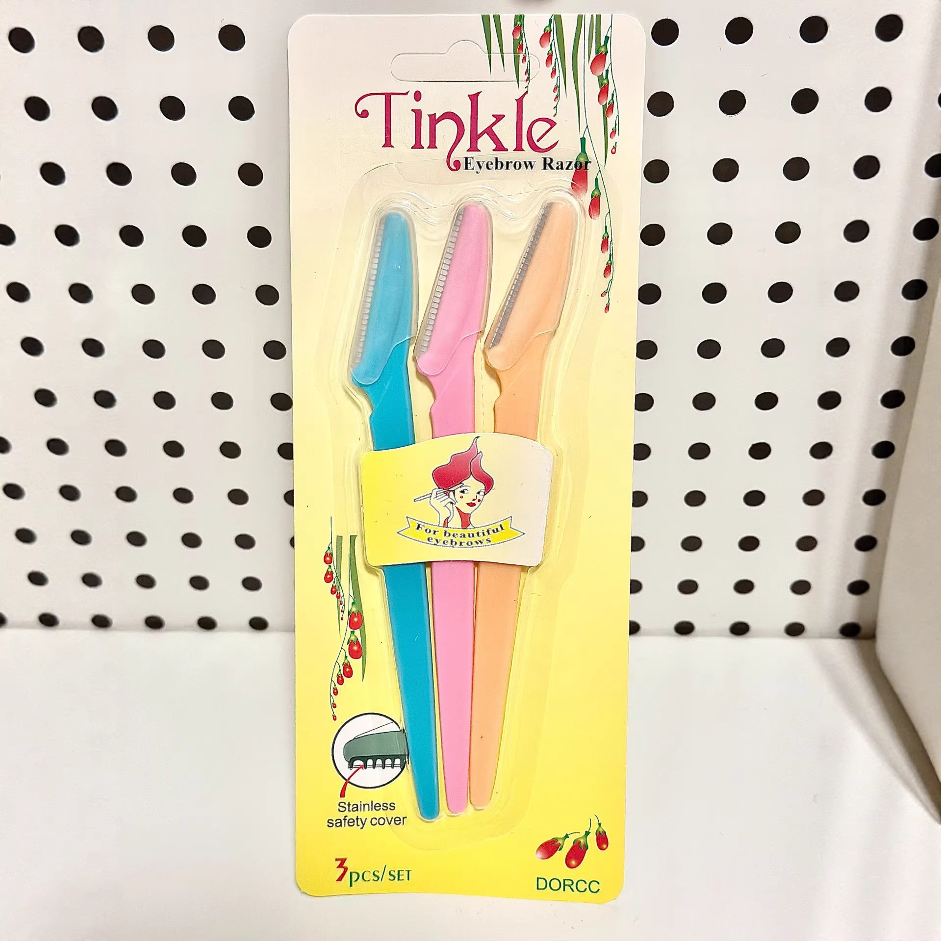 Tinkle set de cuchillo de cejas de tres colores cubierta de seguridad de acero inoxidable cuchillo de cejas portátil artefacto de cejas explosivo transfronterizo