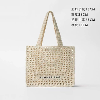 新款夏季仙女镂空草编包小众单肩手提字母编织包女海边度假沙滩包