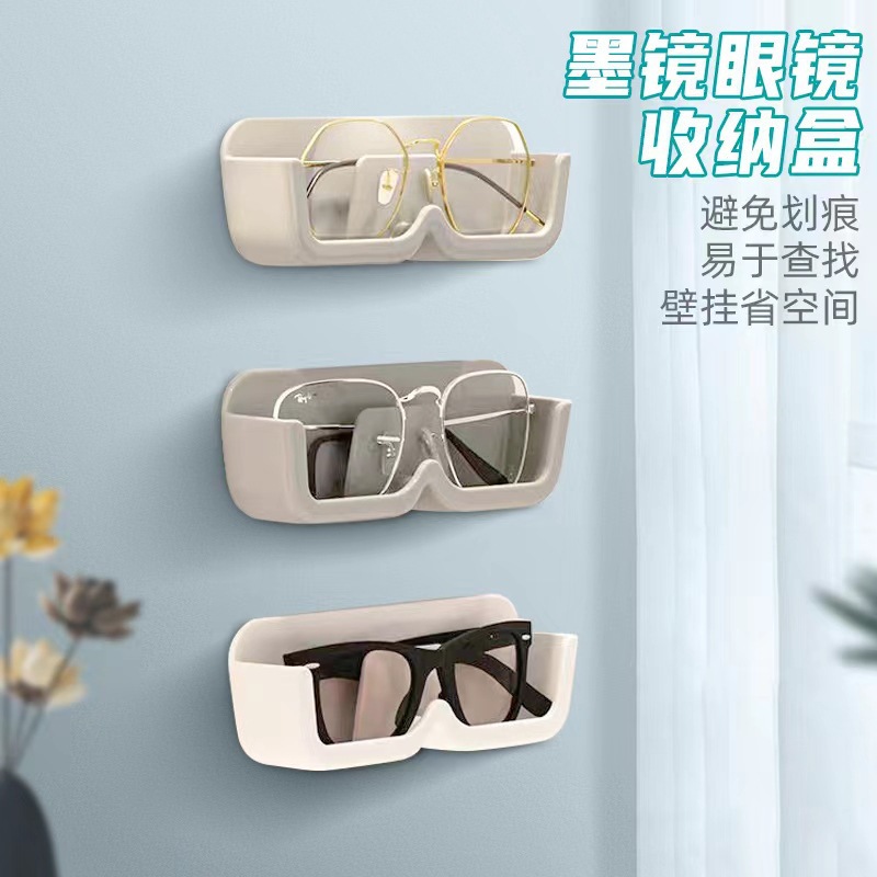 Nueva caja de almacenamiento de gafas sin perforar caja de almacenamiento montada en la pared hogar Simple miopía gafas de sol rack de almacenamiento al por mayor