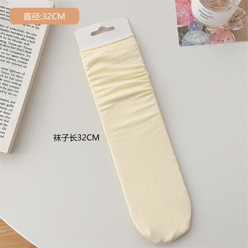 Calcetines de hielo calcetines de terciopelo de primavera y verano para mujer medias de media pantorrilla calcetines de JK largos blancos puros calcetines de moda al por mayor
