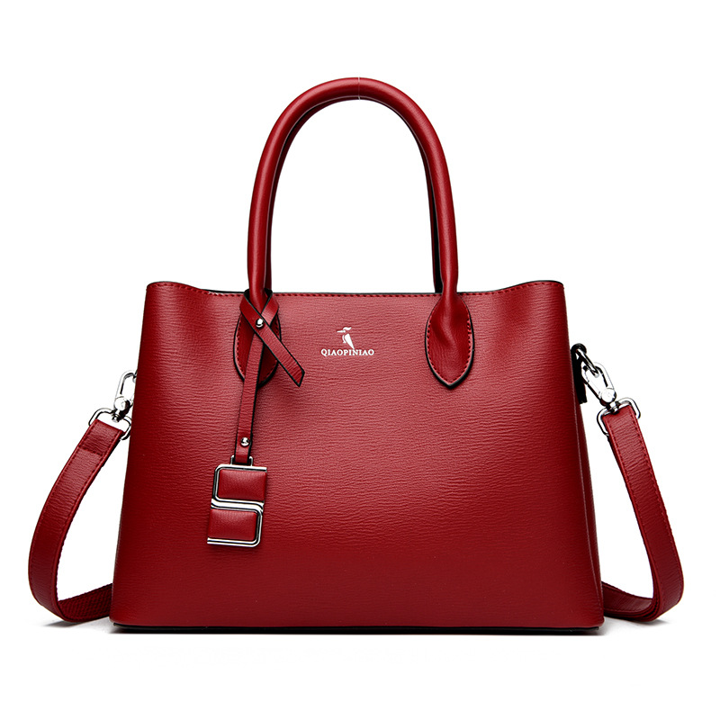 Nuevo bolso de mujer simple de moda, bolso de mano de cuero suave de gran capacidad, bolso de tela de mujer, bolso de canguro