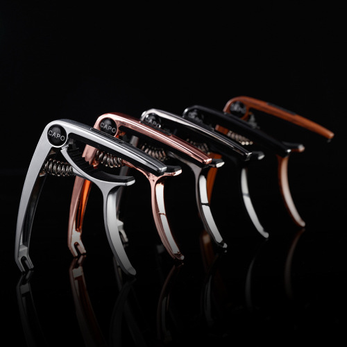 Folk acoustic guitar capo three-in-one multifunctional metal capo ukulele universal capo wholesale