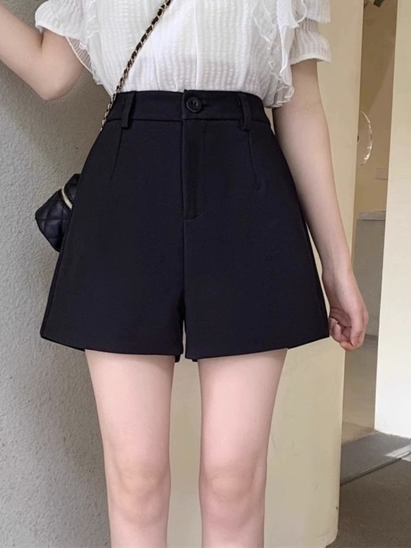 黒いスーツの半ズボンの女性の春の夏の大きいサイズのハイウエストのa字のカジュアルなズボンの外は広い足のズボンを着ています。|undefined