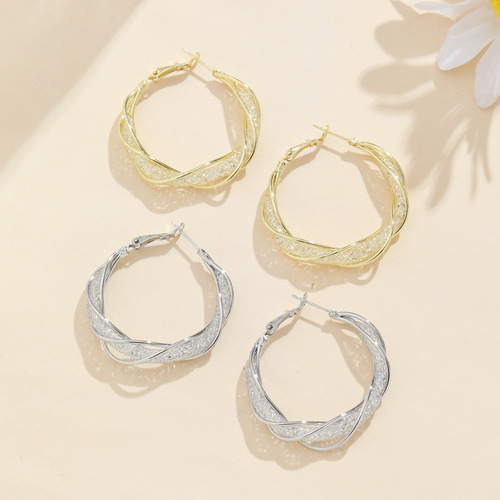 Internet celebrity s925 silver needle French shiny high-end three-thread winding hollow irregular earrings