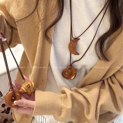手作りのパンのアルカリ水は牛の角の包みを結びます。