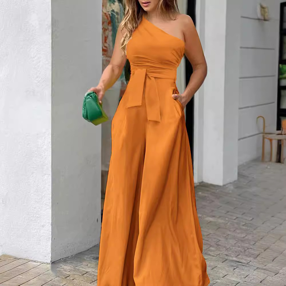 Ropa de mujer europea y americana 2023 Cuello oblicuo de verano con cordones de un solo lado irregular fuera del hombro bolsillo de cintura alta pantalones de pierna ancha mono casual