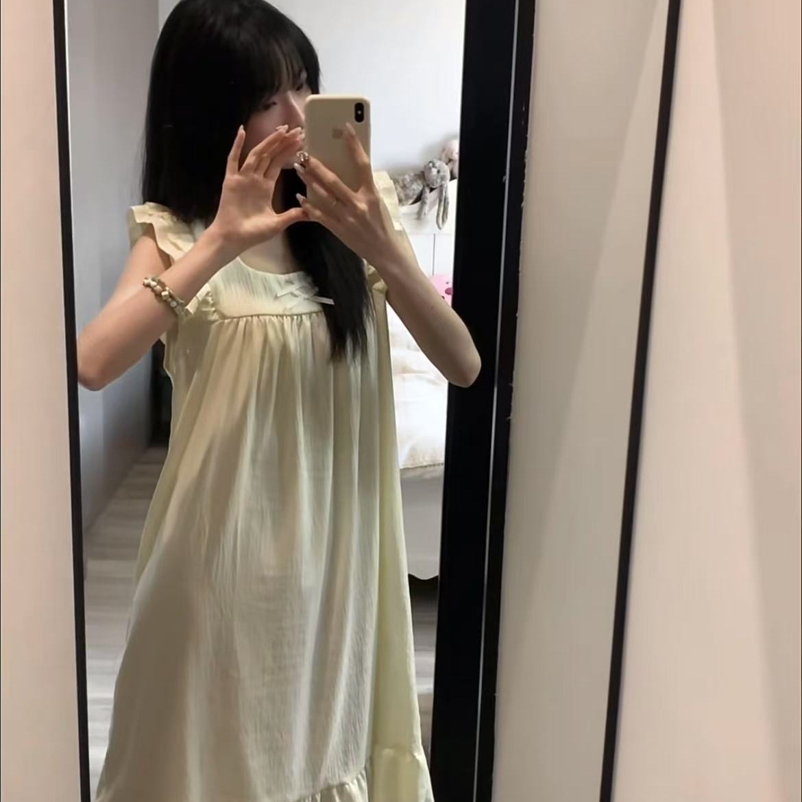 Verano nuevo estilo nube algodón color sólido camisón simple falda media femenina estilo delgado manga pequeña falda de camisón de hogar simple lindo